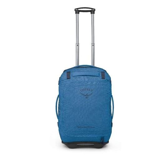 Blue suitcase with wheels on a white background