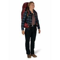 Person wearing a plaid shirt, black pants, and a red backpack on a white background