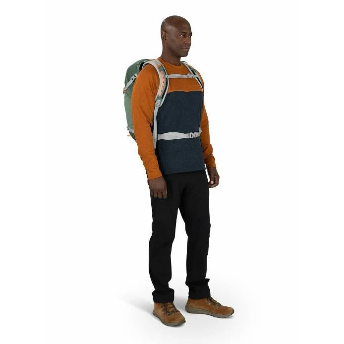 Man wearing a backpack on a white background