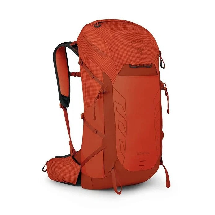 Orange hiking backpack on a white background