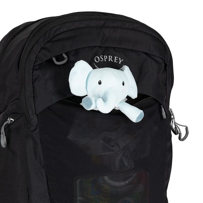 Black Osprey backpack with a plush elephant toy peeking out