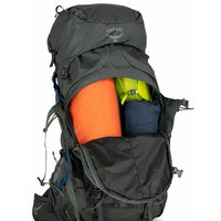 Osprey backpack with colorful items inside on a white background