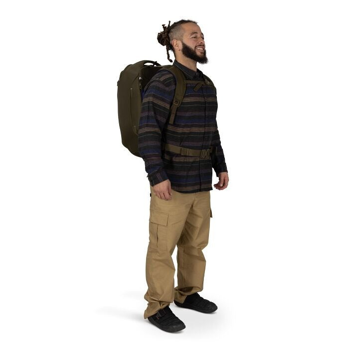 Olive green travel pack worn on back with shoulder straps and top grab handle