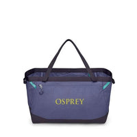 Blue Osprey bag with black handles on a white background