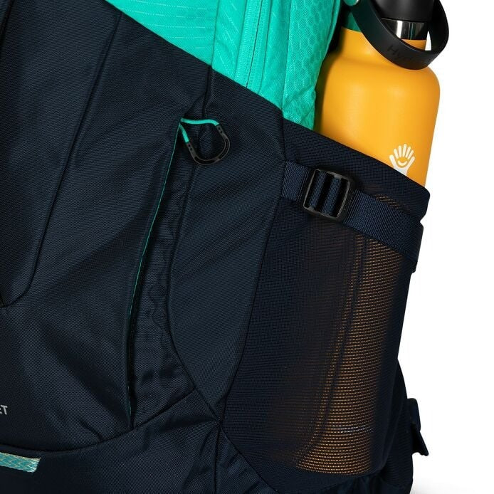 Black 30L backpack close-up of side mesh pocket and adjustable strap