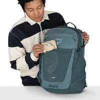 Teal daypack backpack with front zip pocket and OSPREY logo badge