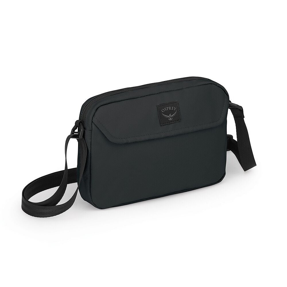 Black crossbody bag with flap front and adjustable shoulder strap