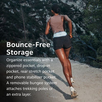 Runner wearing a small waist storage belt with zippered pocket