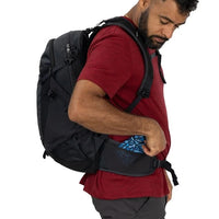 Black hiking backpack with side pocket access and compression-style straps