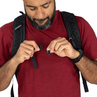 Black hiking backpack with sternum strap and adjustable webbing buckles