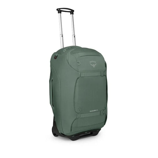 Green wheeled travel backpack with telescoping handle and front storage panel