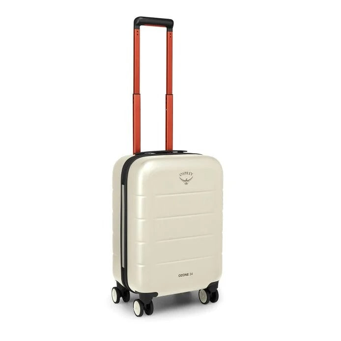 Cream hardside carry-on suitcase with orange handle, telescopic pull, four spinner wheels