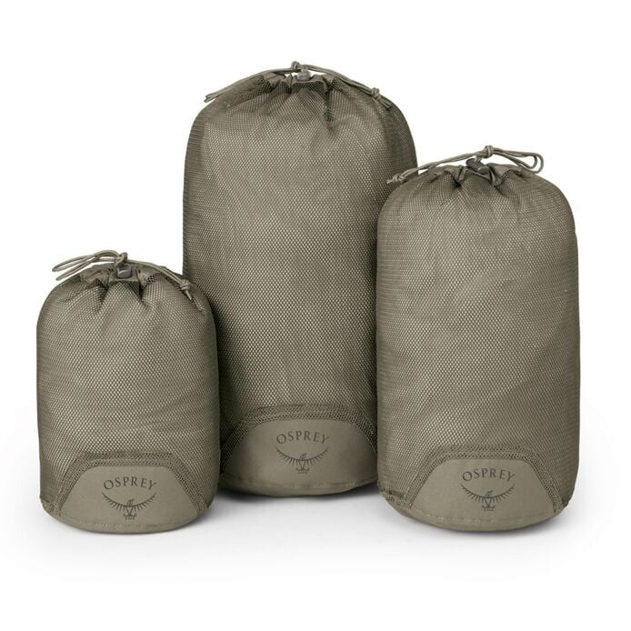 Three Osprey packing cubes of different sizes on a white background
