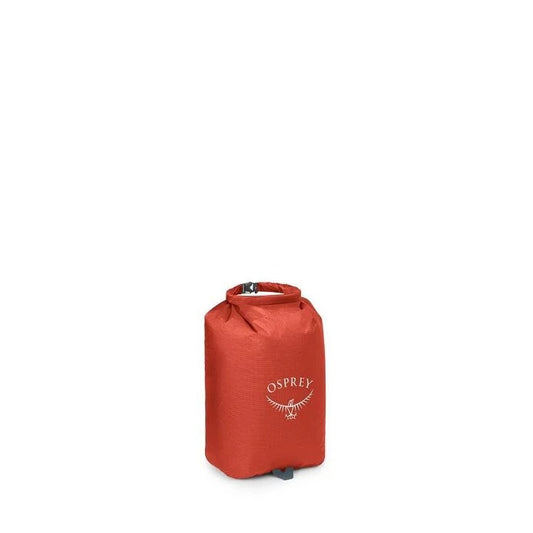 Red Osprey dry bag on a white background