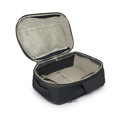 Open travel suitcase with beige interior on a white background