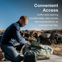 Man opening a green duffel bag in a rocky outdoor setting with text about the bag's features.