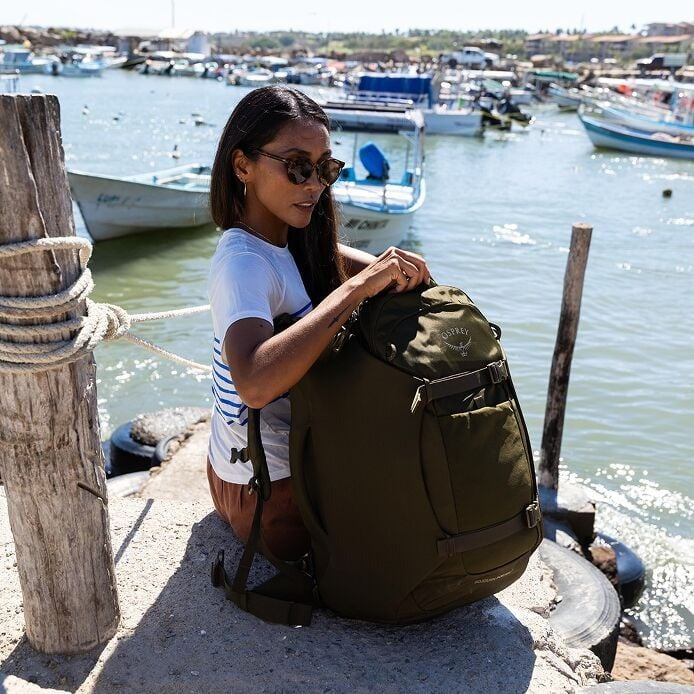 Sojourn Porter™ 46L travel pack, olive green with top handle and side pocket