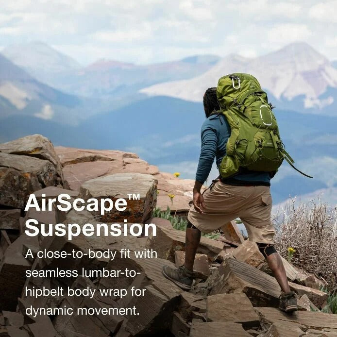 Person hiking with a green backpack on a mountain trail, featuring text about AirScape Suspension.
