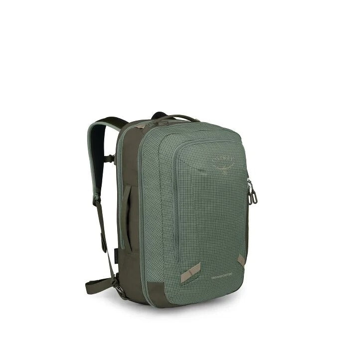 Green travel pack backpack with textured front panel and adjustable straps