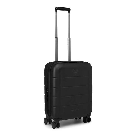 Black hardside carry-on suitcase with upright handle and four spinner wheels