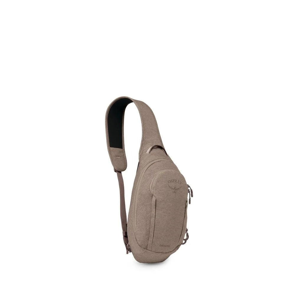 Beige sling bag with single shoulder strap, curved front pocket and small zip pull tab