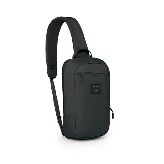 Aoede sling bag in black with front zip pocket and adjustable shoulder strap