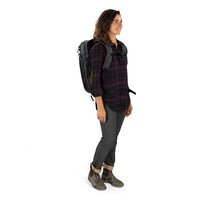 Person wearing a backpack on a white background