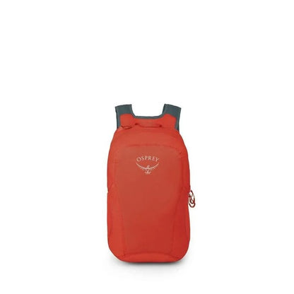 Red Osprey backpack on a white background