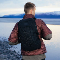 Talon™ 11 VSN^ backpack in black, rear view with webbed panel and compression straps