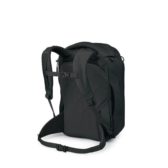 Black travel backpack side view with shoulder harness and compression strap