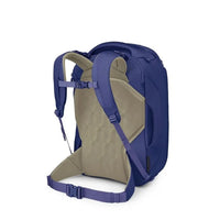Blue travel backpack shown open with beige interior and front-access panel