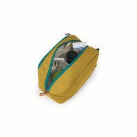 Yellow toiletry bag with teal zipper on a white background