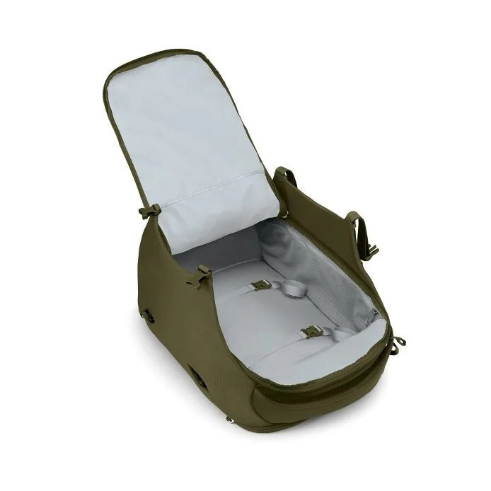 Olive green travel backpack open flat with light interior and zipped storage