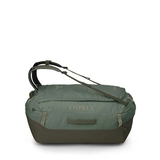 Green Osprey travel bag on a white background